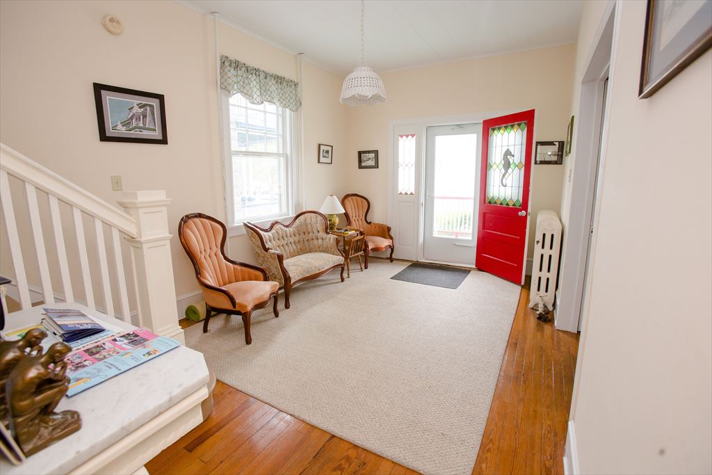 A foyer with a story at Sea Foam Manor, Cape May